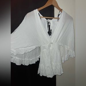 White swimsuit coverup